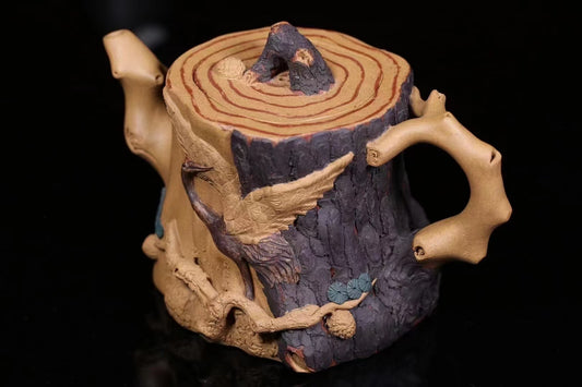 Chinese wood carving pine red-crowned crane teapot"Handcrafted Tricolor Pine Stump Teapot with Carved Pine and Crane Designs"